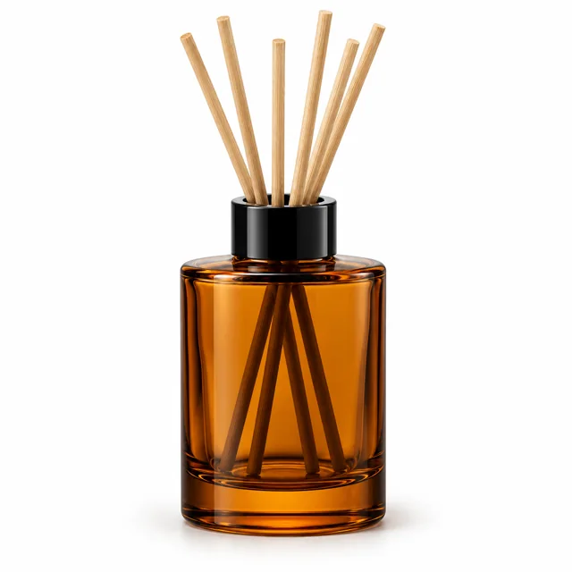 150ml Amber Cylinder Glass Reed Diffuser Bottle — transparent amber; black open diffuser collar and rattan reeds