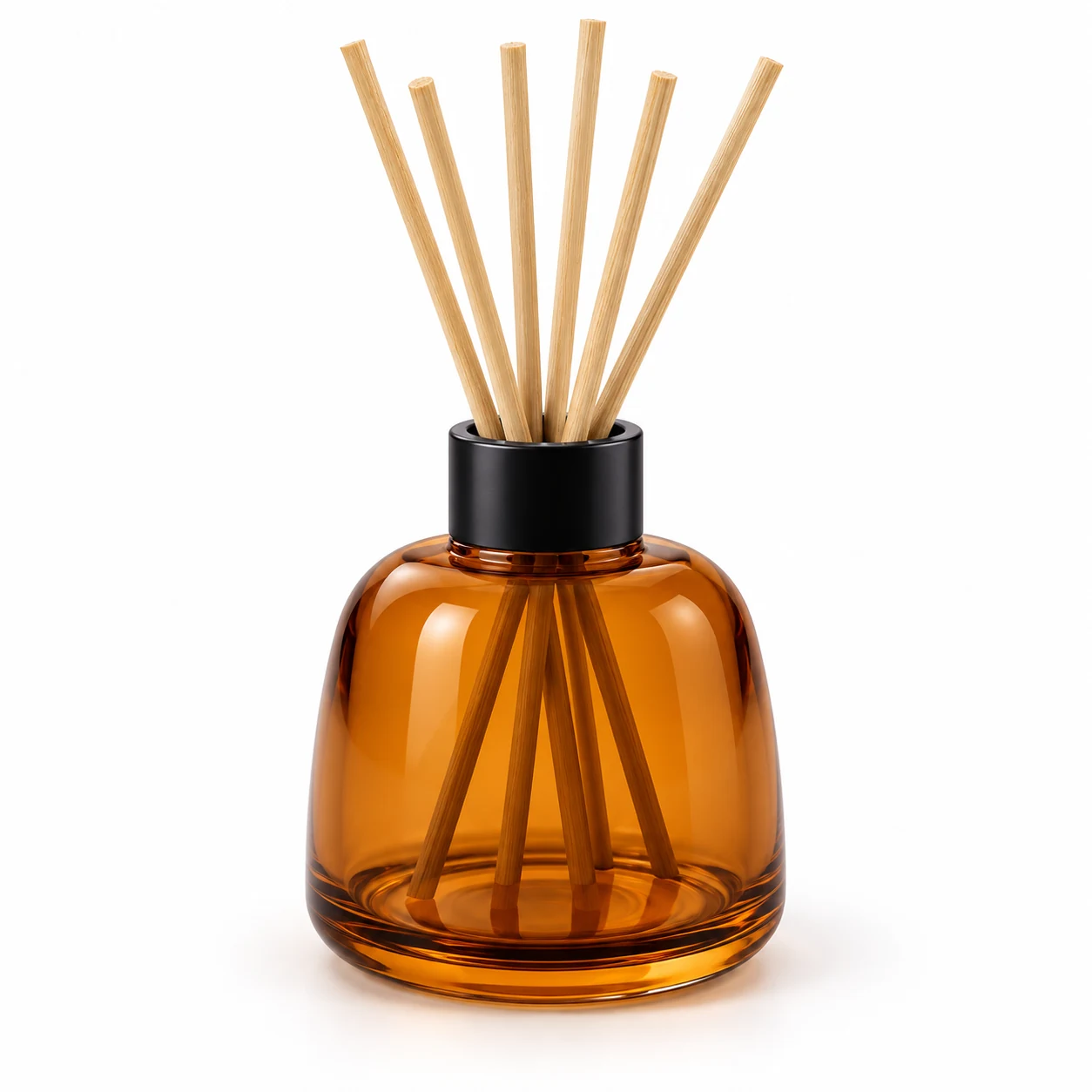 100ml Amber Rounded Shoulder Glass Reed Diffuser Bottle — transparent amber; black open diffuser collar and rattan reeds